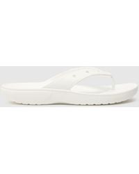 Crocs™ - Classic Flip Sandals In - Lyst