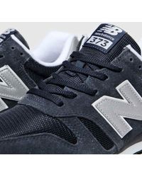 new balance navy & silver 373 trainers