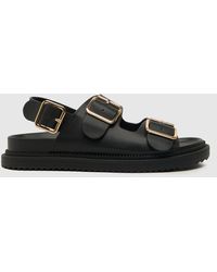 Schuh - Talbot Double Buckle Sandals In - Lyst