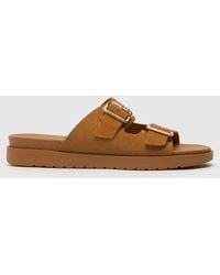 Schuh - Trista Suede Buckle Footbed Sandals In - Lyst