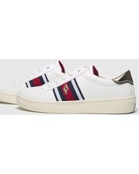 skechers white goldie striped trainers