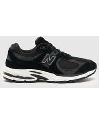 New Balance - M2002 Trainers In Grey & Black - Lyst