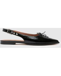 schuh - Lorie Pointed Hardware Flats - Lyst