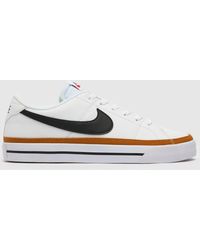 nike white & black court legacy next nature trainers
