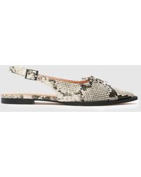 schuh - Lorie Pointed Hardware Flats - Lyst