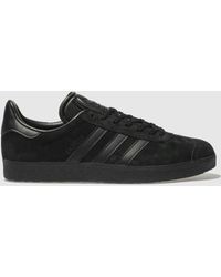 womens black gazelles