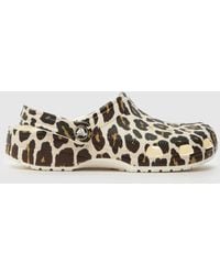 Crocs™ - Classic Leopard Clog Sandals - Lyst