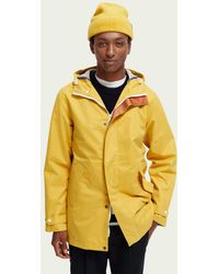 Yellow Down and padded jackets for Men | Lyst