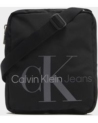 Calvin Klein Synthetic Recycled Polyester Weekend Bag in Black for Men Mens Bags Duffel bags and weekend bags 