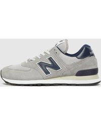 New Balance 574 Sneakers for Men - Up 