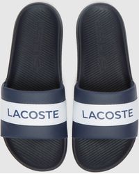Men's Lacoste Slippers from $46 | Lyst