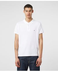 Tommy Hilfiger Polo shirts for Men - Up to 50% off | Lyst