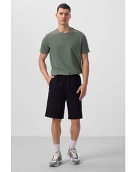 TOMMY LIFE - Oversized Cotton-Blend Knit Shorts - Lyst