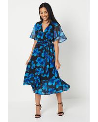 Wallis - Petite Floral Print Wrap Midi Dress - Lyst