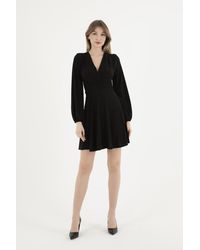 Hiccup - V Neck Long Sleeve Mini Skater Dress - Lyst