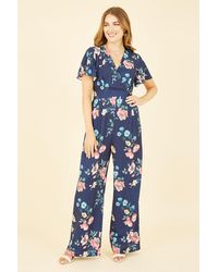 Yumi' - Floral Angel Sleeve Jumpsuit - Lyst