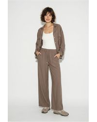 Bianco Lucci - Two-Piece Crepe Blouse And Wide-Leg Trousers - Lyst