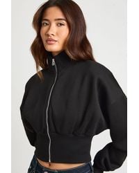 Boohoo - Funnel Neck Cinched Waist Zip Through - Lyst