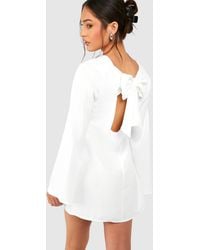 Boohoo - Petite Bow Detail Open Back Mini Dress - Lyst