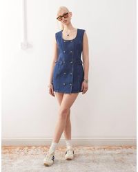 Lioness - Double Button Front Pocket Detail Denim Mini Dress - Lyst