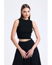 Hiccup - Knitted Round Neck Ruffled Sleeveless Cropped Sweater - Lyst
