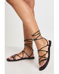 Boohoo - Wide Fit Strappy Wrap Up Sandals - Lyst