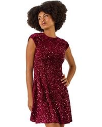 Roman - Sequin Bow Back Flare Dress - Lyst