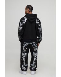 BoohooMAN - Baggy Fit Floral Embroidered Joggers - Lyst
