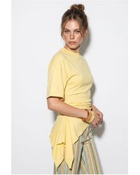 Bianco Lucci - Fitted Jersey Blouse With Drape Detail - Lyst
