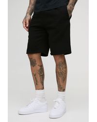 BoohooMAN - Tall Loose Fit Mid Length Bm Signature Shorts - Lyst