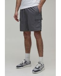BoohooMAN - Relaxed Fit Elasticated Nylon Cargo Shorts - Lyst
