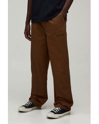 BoohooMAN - Relaxed Fit Half And Cargo Embroidered Trousers - Lyst
