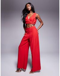 ASOS - Wrap Front Cut Out Jumpsuit With Buckle Detail - Lyst