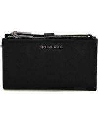 Michael Kors - Jet Set Travel Large Double Zip Wristlet - Lyst