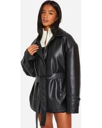 Boohoo - Petite Belted Faux Leather Trench Coat - Lyst