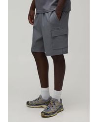 BoohooMAN - Relaxed Fit Elasticated Technical Stretch Cargo Shorts - Lyst
