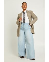 Boohoo - The Plus Mid Waist Wide Leg Jean - Lyst