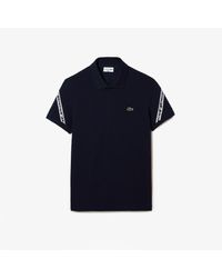 Lacoste - Regular Fit Stretch Mini Pique Poloshirt In Blauw - Lyst