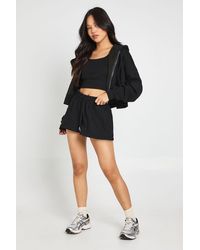 Boohoo - Petite Deep Hem 3 Piece Crop Zip Through Short Tracksuit - Lyst