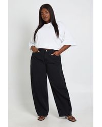 Boohoo - Plus Mid Waist Twisted Seam Barrel Leg Jean - Lyst