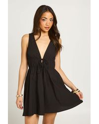 Boohoo - Deep V Front Tie Mini Skater Dress - Lyst