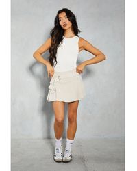 MissPap - Belted Pleated Mini Skirt - Lyst