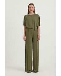 Hiccup - 2 Pieces: Round Neck Asymmetrical Crop Top & High Waist Relaxed Fit Trousers - Lyst