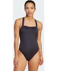 adidas - Iconisea Padded Premium X-Back Swimsuit - Lyst