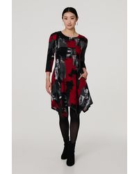 Izabel London - Abstract 3/4 Sleeve Hanky Hem Midi Dress - Lyst