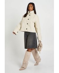 Boohoo - Petite Funnel Neck Button Up Trench Coat - Lyst
