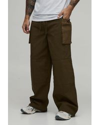 BoohooMAN - Baggy Fit Elasticated Bellow Pocket Cargo Trousers - Lyst