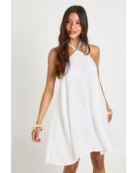 Boohoo - Cheesecloth Halter Mini Beach Dress - Lyst