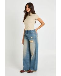 Boohoo - Mid Waist Ripped Wide Leg Jean - Lyst