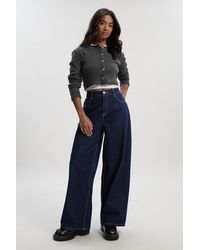 Boohoo - Petite Mid Waist Loose Fit Wide Leg Jean - Lyst
